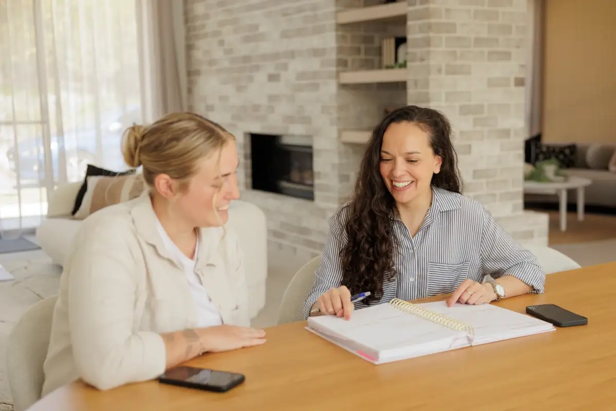 Lou consulting with a client about their interior design