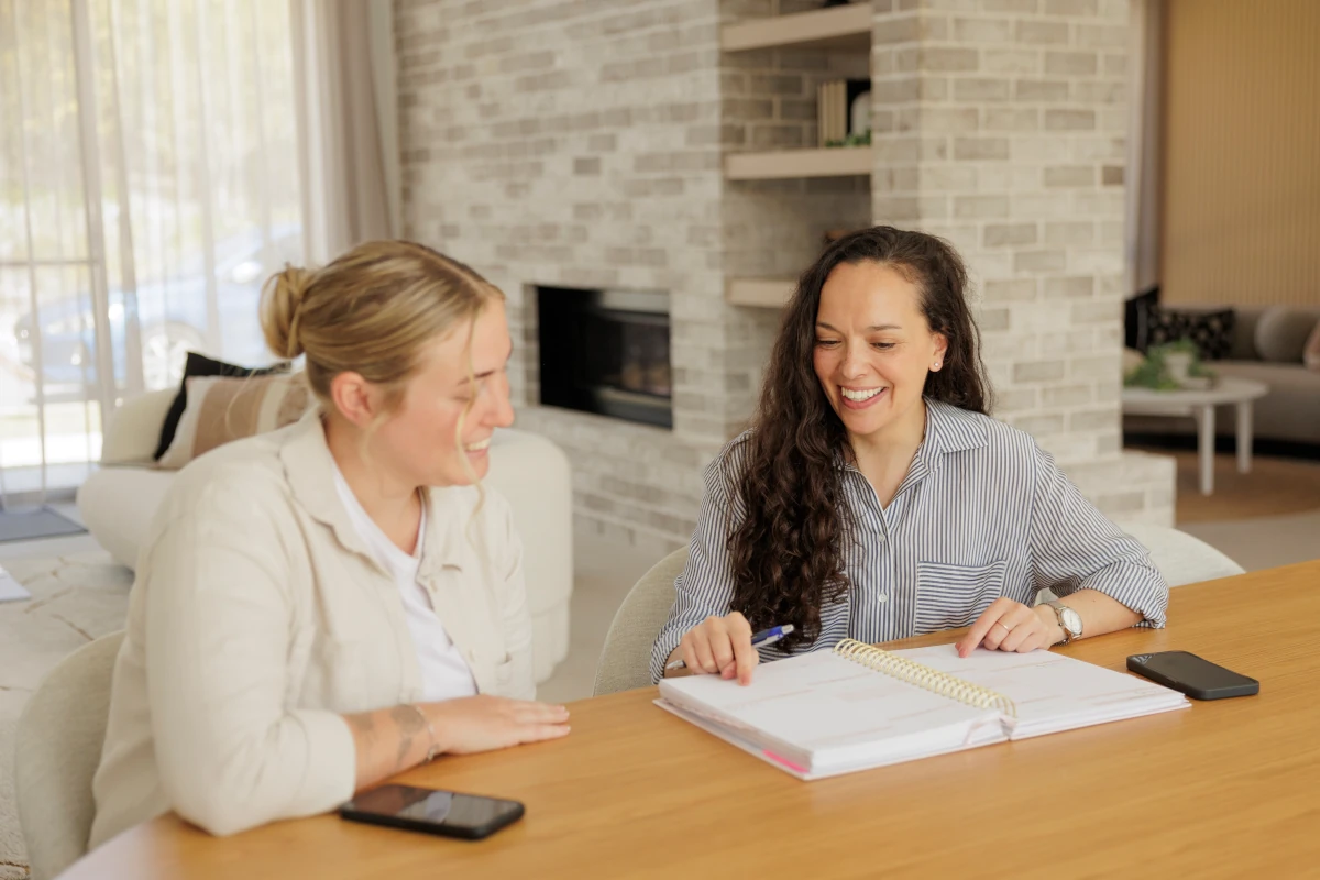 Lou consulting with a client about their interior design